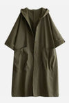 The Army Green One Size Fits All Oversized Waterproof Windbreaker Jacket by looselyboho features a long, olive-green design with a hood and buttons down the front. It boasts large front pockets, an oversized fit, and loose, wide sleeves. This waterproof jacket ensures a stylish look while maintaining simplicity and functionality.